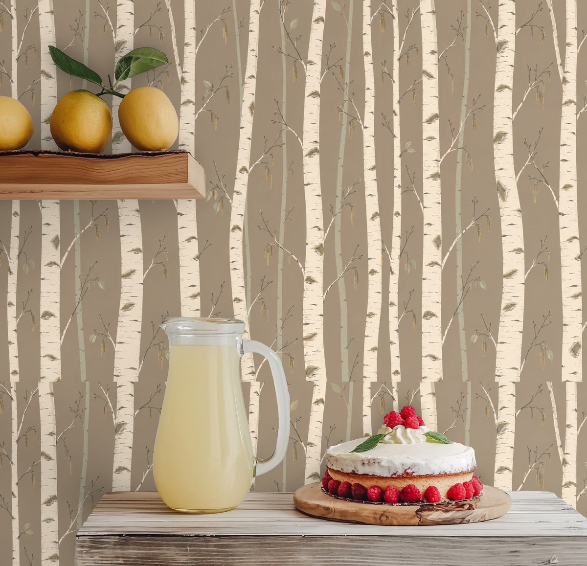 Nursery wall with a crib placed in front of the birch pattern, showing how the design reads softly in a child's room.
