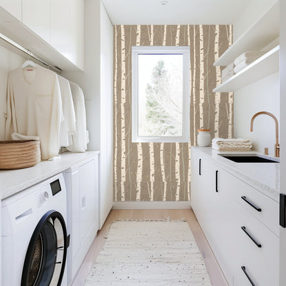 Full-wall crop of the pattern showing alternating cream and pale sage trunks with delicate buds and hanging catkins.