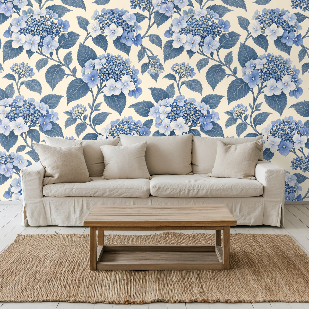 Bed area with green upholstered frame and hydrangea wallpaper creating a floral backdrop
