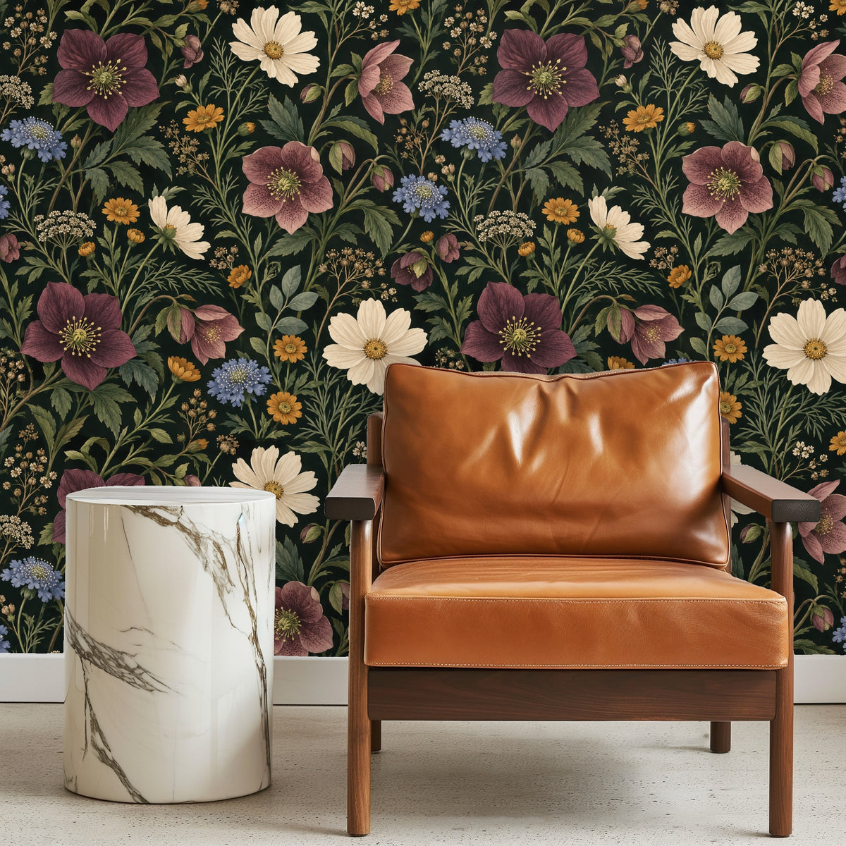 Bedroom scene with Nocturne Herbarium as a headboard wall, warm natural textiles and soft daylight.