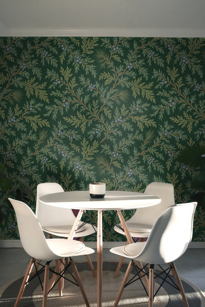 Tight crop of the wallpaper showing a cluster of slate-blue berries and fine needlework on the evergreen background