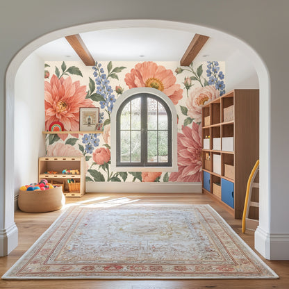 Modern living room with an arched doorway and the large-scale floral mural covering the full wall behind curved seating.