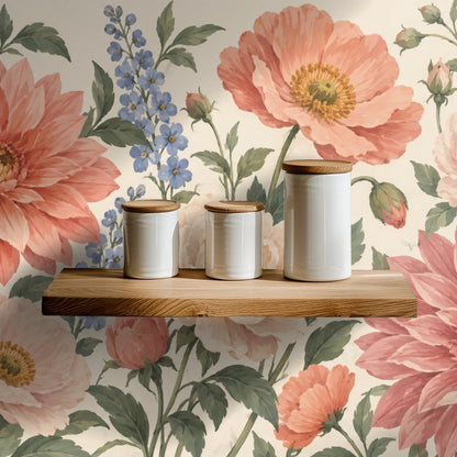 Sunlit arched room with the floral wallpaper filling the wall and natural light accenting coral petals and periwinkle accents.