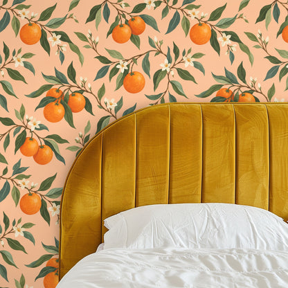 Bedroom headboard shot with the wallpaper showing repeating orange fruit and foliage.