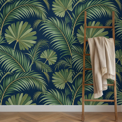 Living room styling with a neutral sofa against the large-scale indigo palm mural