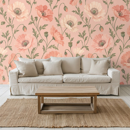Living room wall dressed in the blush poppy design behind a neutral slipcovered sofa and natural wood coffee table.