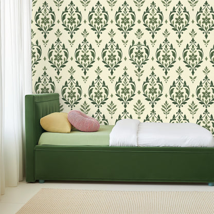 Close-up of sage arabesque wallpaper showing floral medallion repeat on cream background