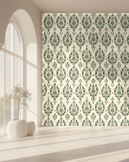 Nursery vignette with crib and half-wall wainscoting paired with sage arabesque wallpaper above