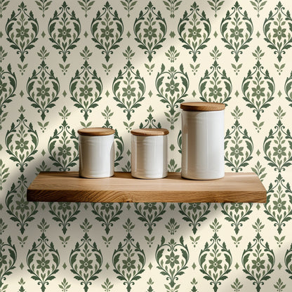 Floor mirror leaning against a wall covered in sage arabesque wallpaper, showing pattern scale
