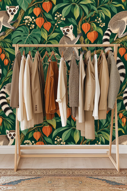 Pattern detail showing cluster of orange lantern flowers and intricate green palm and monstera leaves.