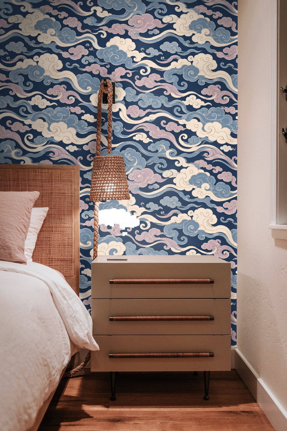 Artistic cloud shapes with looping outlines in a repeating pattern.