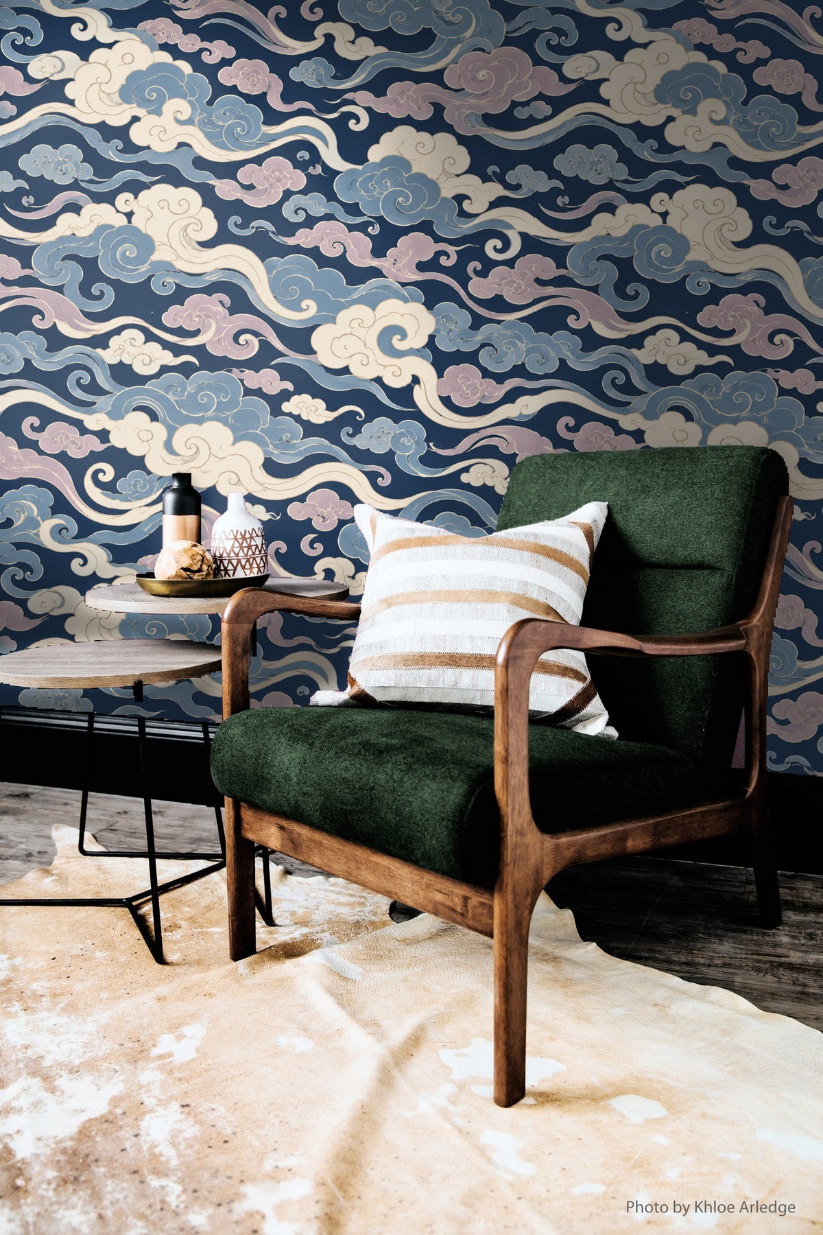 Wall segment showing layering of cloud shapes in soft pastel and deep hues.