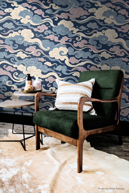 Wall segment showing layering of cloud shapes in soft pastel and deep hues.