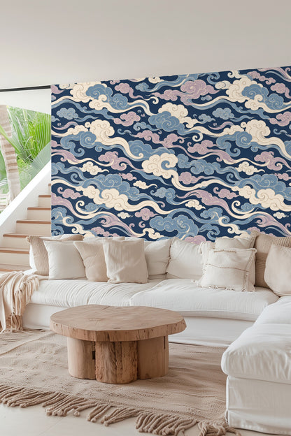Bedroom wall adorned with flowing cloud design in blue, lavender, and cream tones.