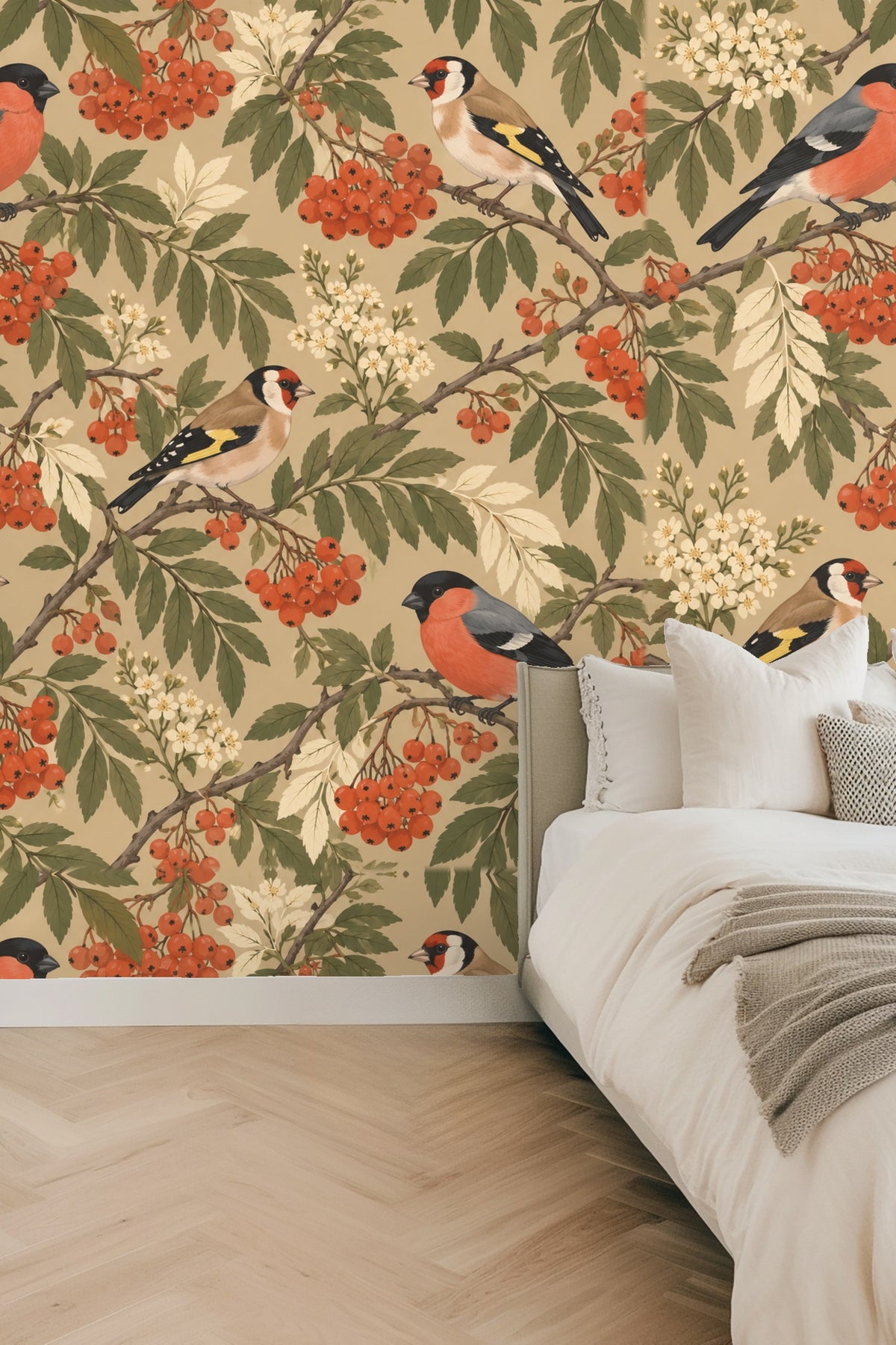 Goldfinch with red and yellow wing accents on wallpaper branch