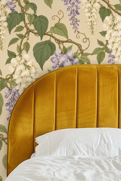 Living room corner showcasing Wisteria Ribbonfall wallpaper behind a round wooden side table.