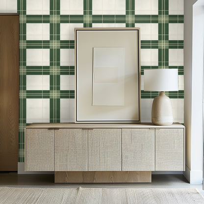 Entryway view with Forest Loom Plaid spanning a full wall behind a console, demonstrating architectural scale and repeat.
