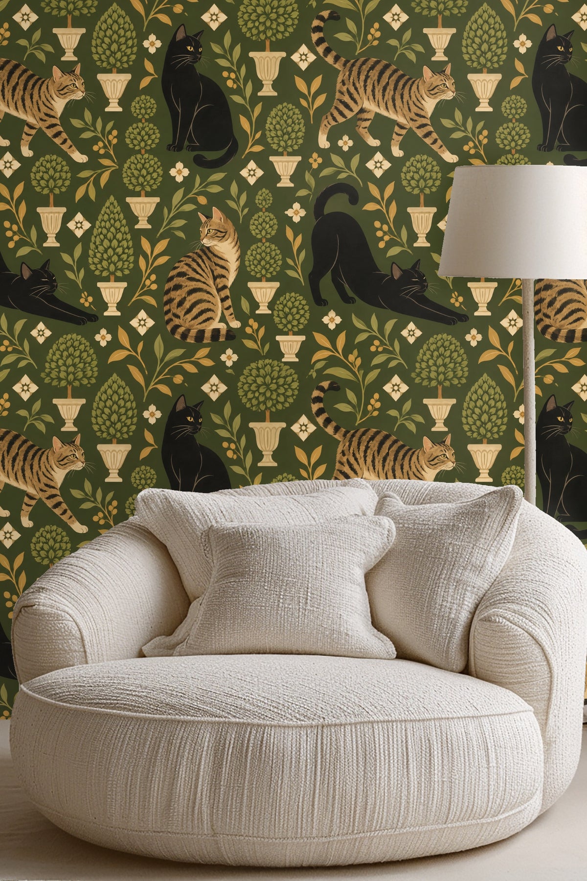 Stylish study with olive-toned wallpaper featuring cats and plants, highlighting cozy ambiance