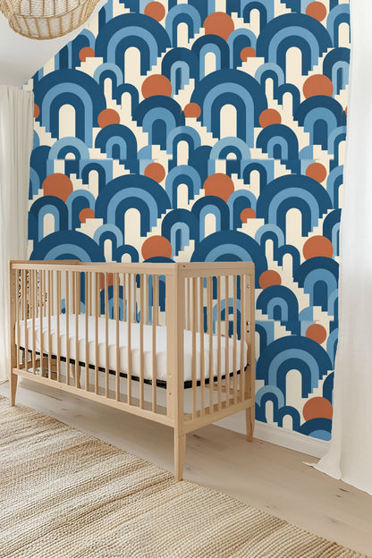 Soft light highlighting the geometric shapes in terracotta and blue tones on wallpaper.