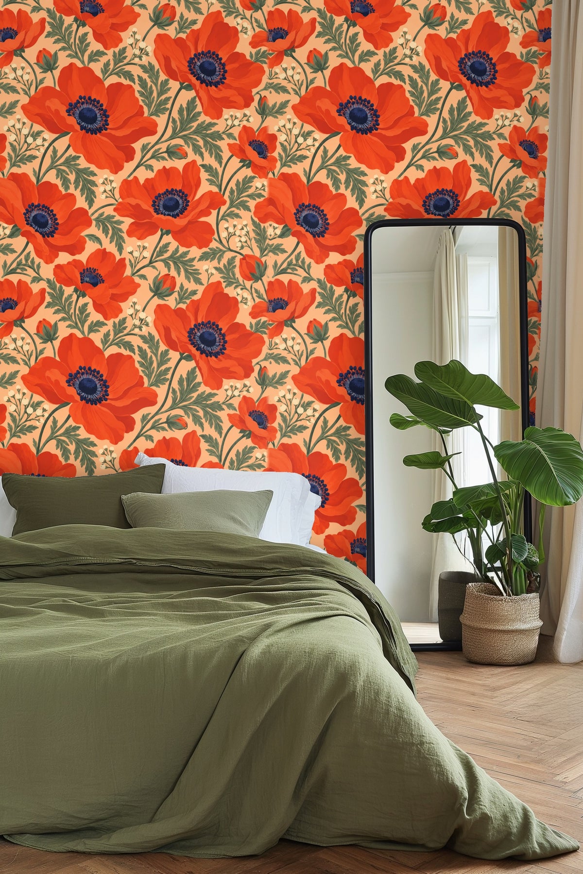 Living room corner with plush white cushioned chair and round wood table against vivid persimmon anemone wallpaper on peach background