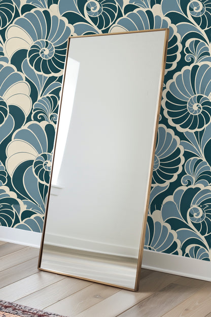 Wallpaper pattern repeat of nautilus shell spirals with curved, scalloped segments in varying blue tones.