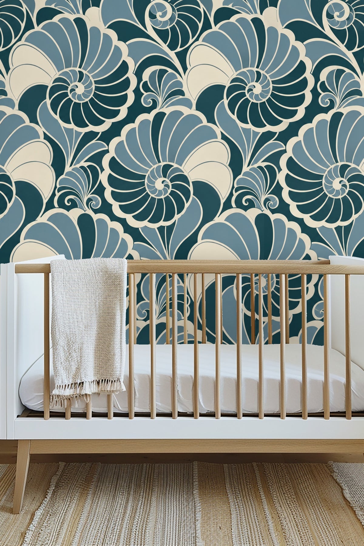Bedroom headboard in olive green velvet against wallpaper featuring large, segmented nautilus shell patterns in blue hues.