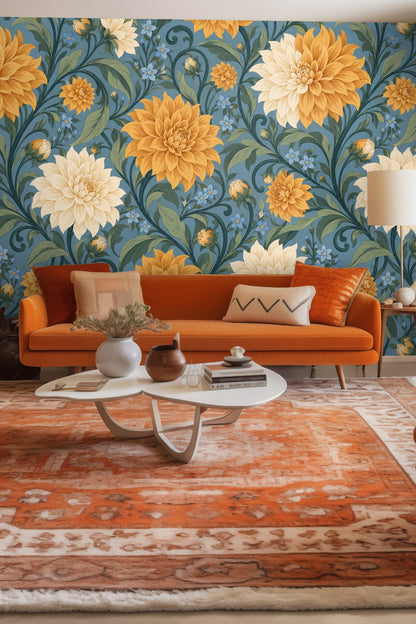 Large amber dahlia flower on blue background wallpaper