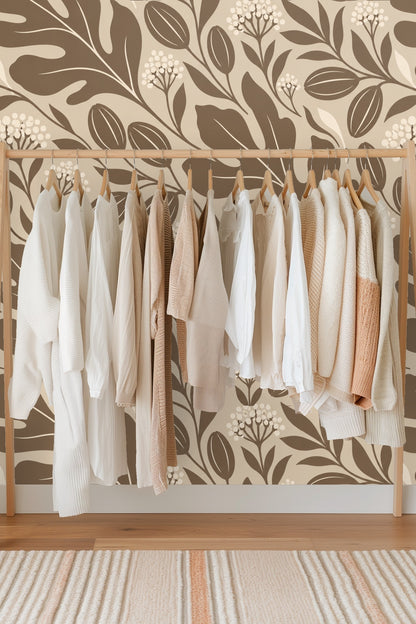 Wallpapered wall behind wooden bathroom cabinet with bottles and containers