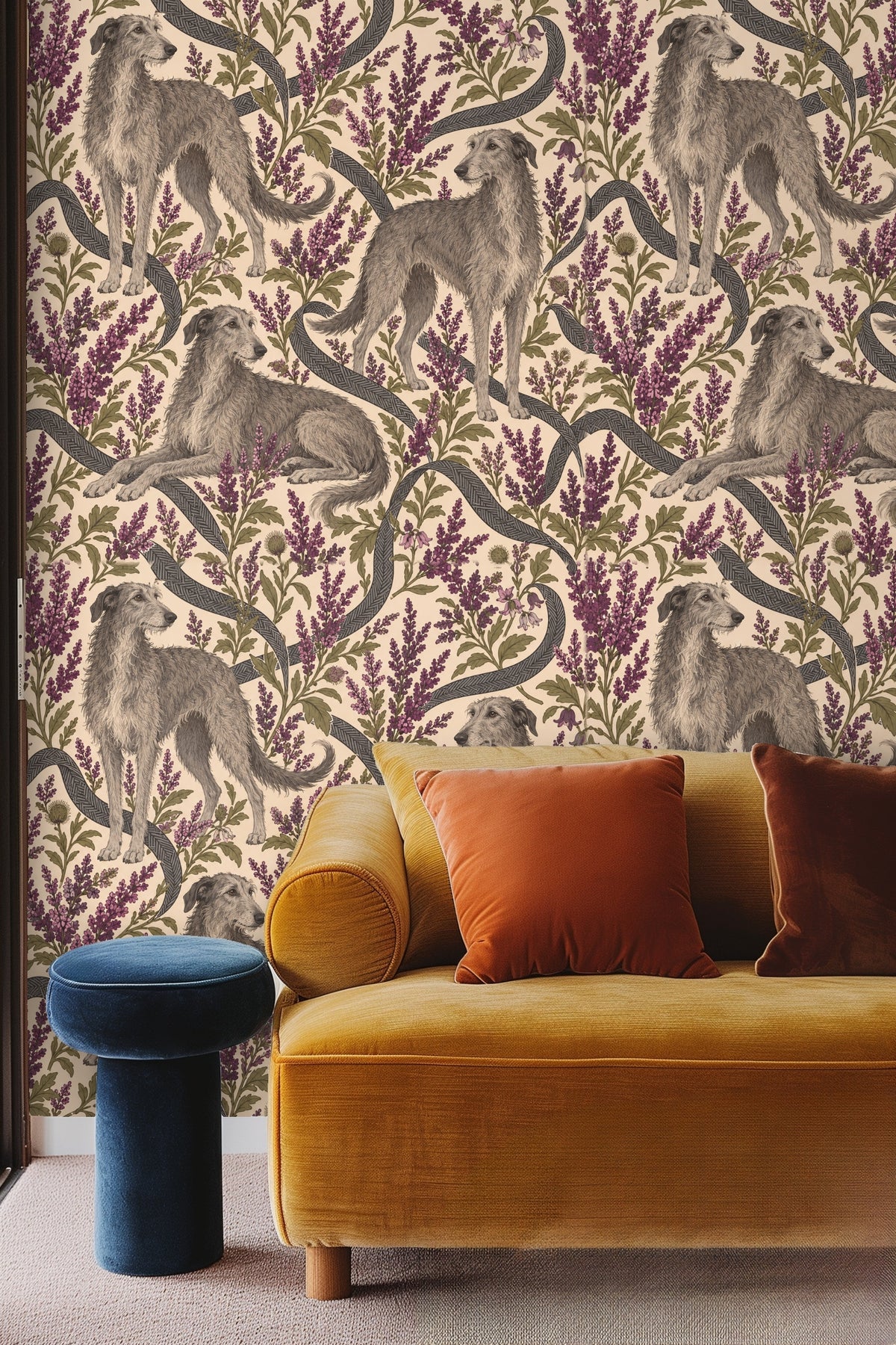Close-up photo of a bedroom wall with Heather Hounds wallpaper behind a rattan headboard and white bedding