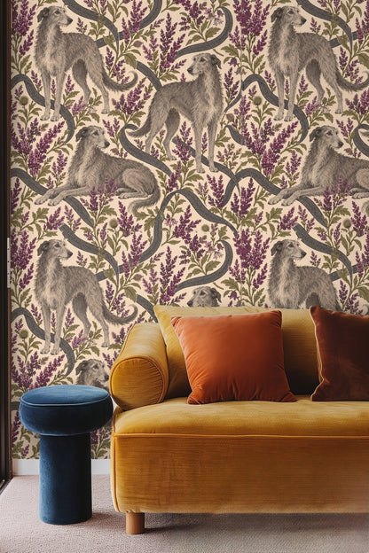 Close-up photo of a bedroom wall with Heather Hounds wallpaper behind a rattan headboard and white bedding