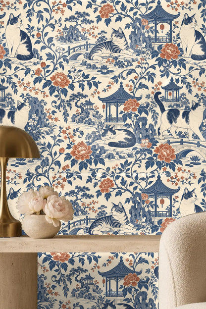 Sleeping cat illustration in blue and terracotta surrounded by peonies and garden elements
