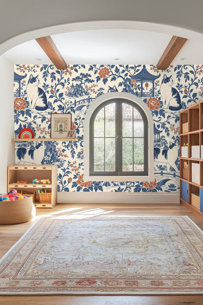 Blue and white tabby cat reclining on rock amidst garden flora in wallpaper