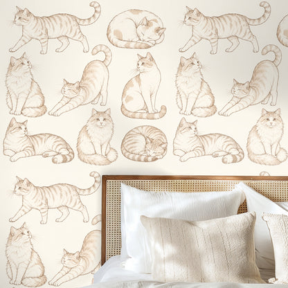 Close-up of the original artwork showing hand-drawn cats in sepia on a warm cream background
