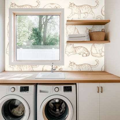Decor vignette with candle and flowers in front of the cat wallpaper showing medium-scale motif spacing