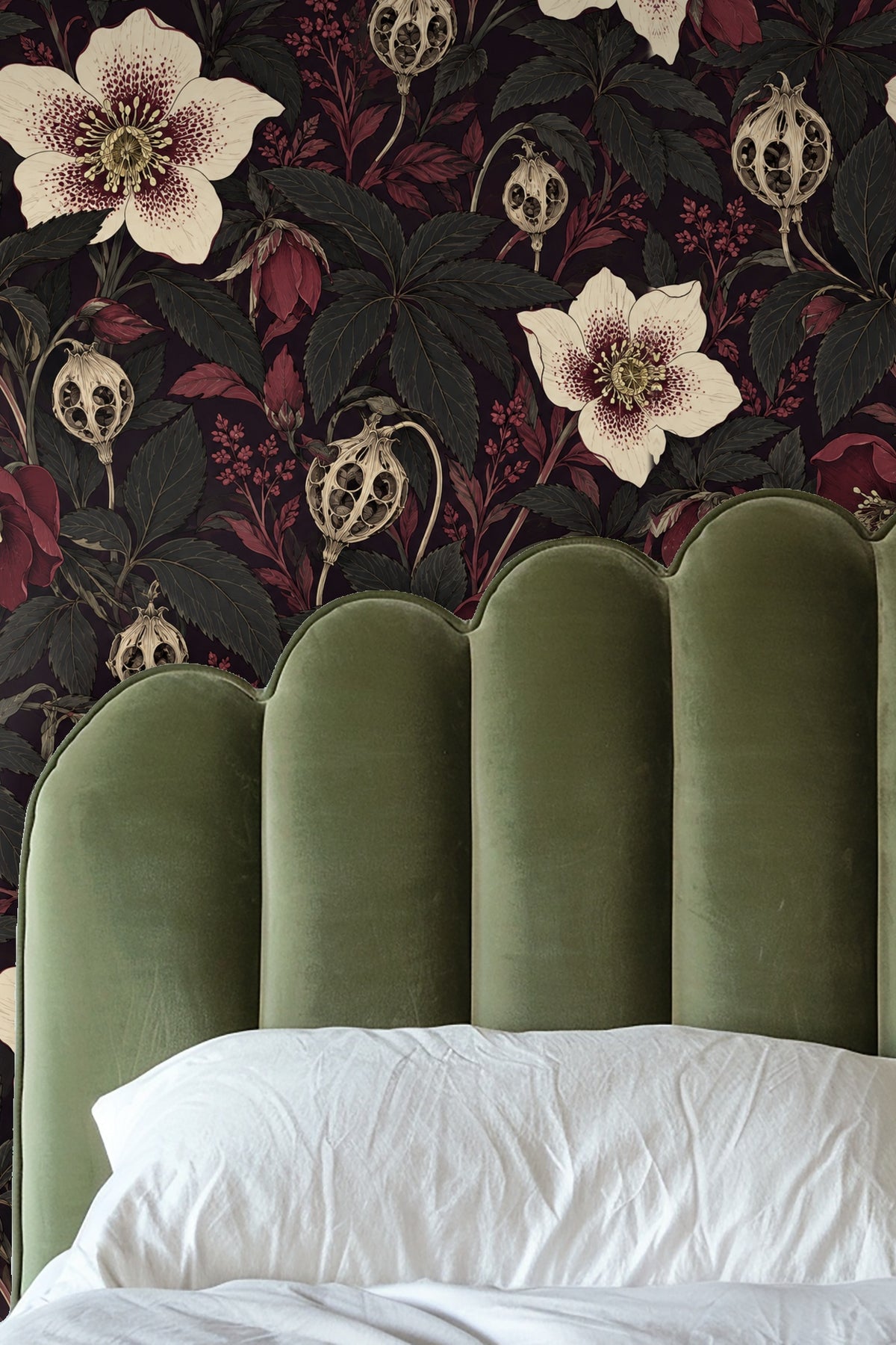 Softly lit room corner featuring textured botanical wallpaper