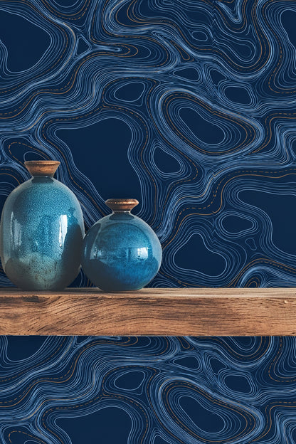 Elegant curved lines swirling on dark blue background, wallpaper detail
