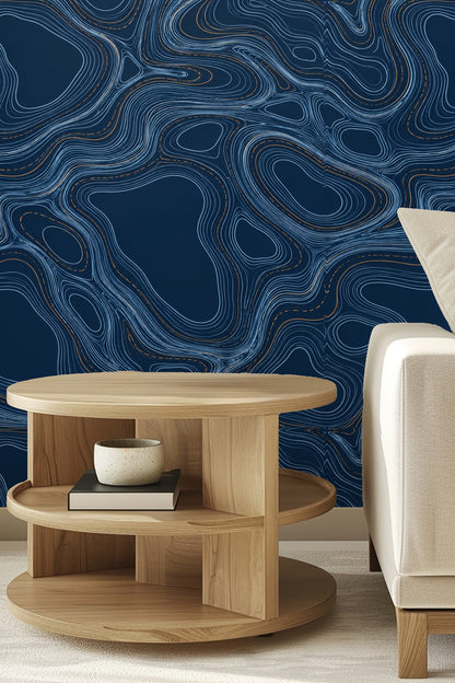 Abstract engraved contour line wallpaper in a bedroom with green bedframe and light bedding