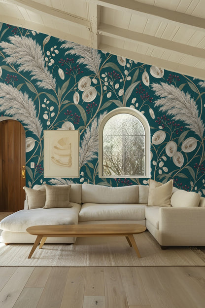 Seed pods and botanical elements arranged in balanced pattern on teal wallpaper