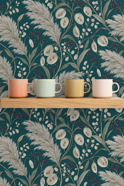 Decorative berries and slender leaves interspersed among pampas grass on teal wallpaper