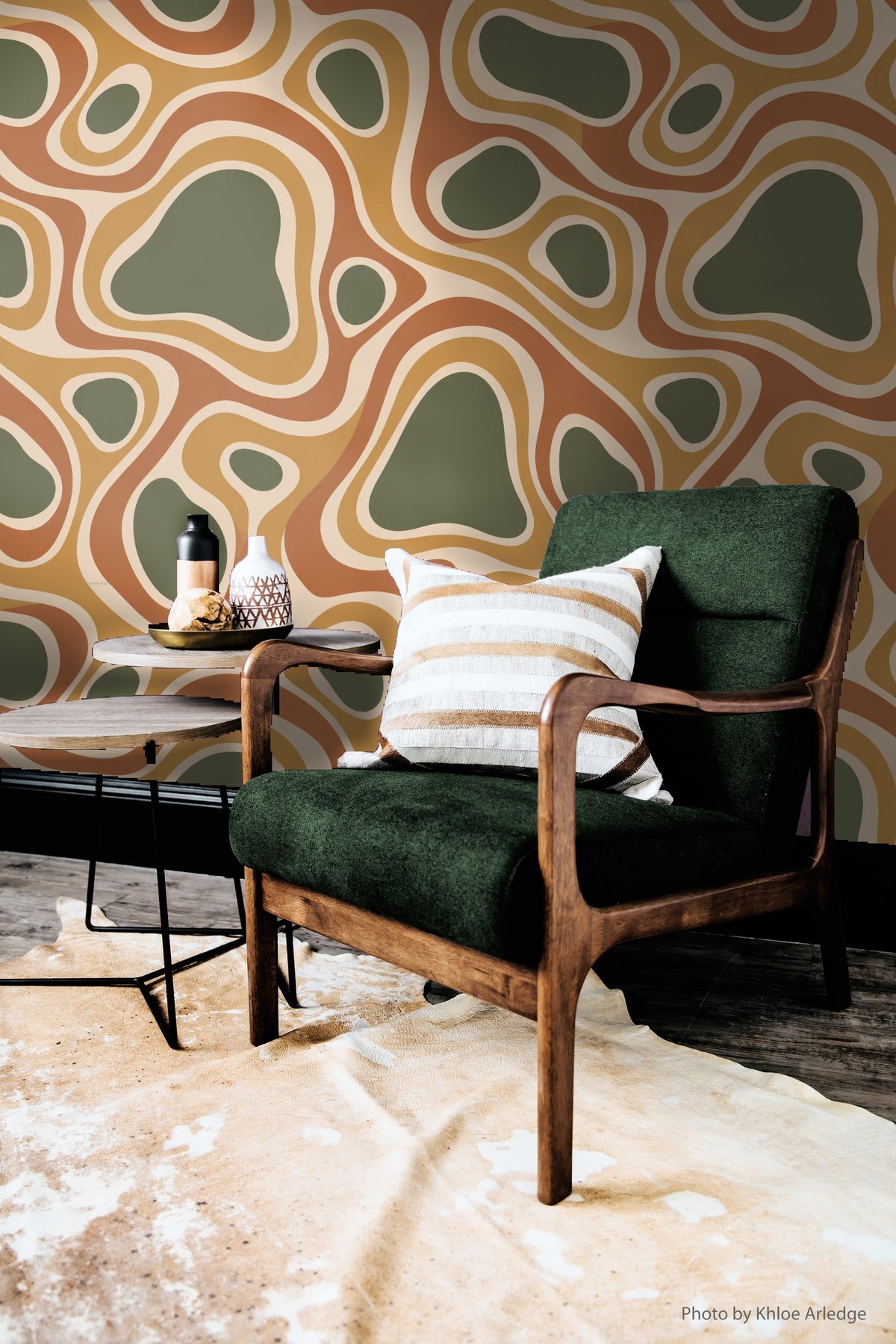 Natural light highlighting the warm tonal range of wallpaper in bedroom setting.
