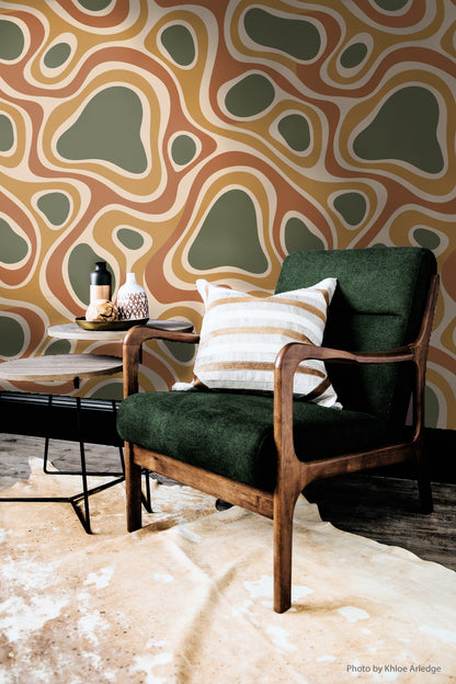 Natural light highlighting the warm tonal range of wallpaper in bedroom setting.