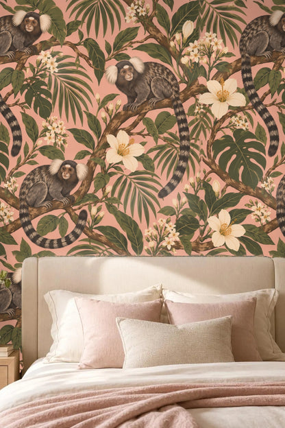 Living room with rose palm marmoset wallpaper hosting a curved pink velvet sofa and round marble coffee table