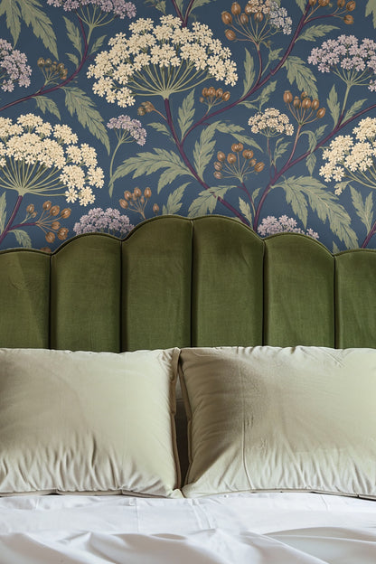 Close-up of Dusky Umbel Lattice wallpaper showing cream and lavender umbels with green leaves on a dusky blue background