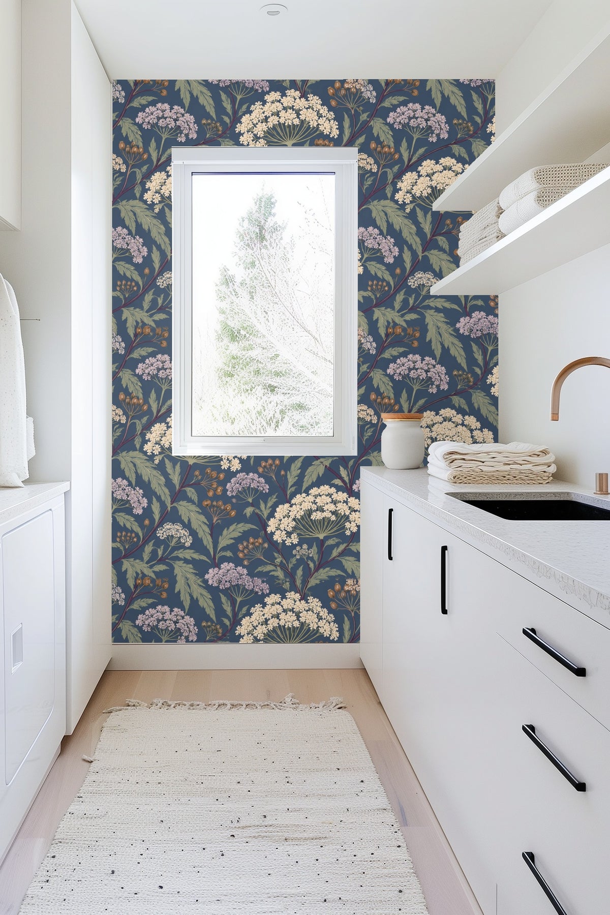 Detailed view of cream-colored umbel flowers and seed pods on dusky blue wallpaper