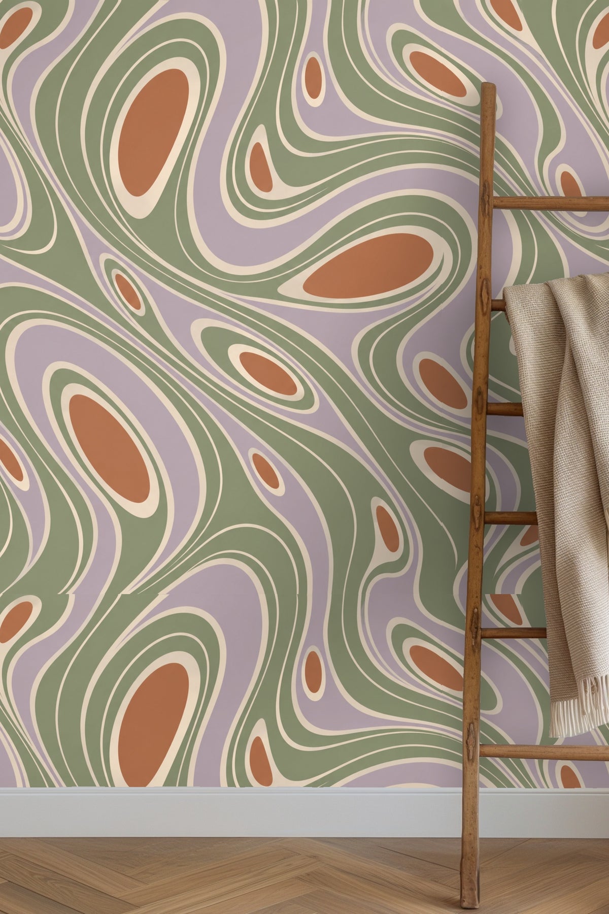 Close-up of Salvia Flow Contours wallpaper showing green, lavender, terracotta, and cream curving shapes