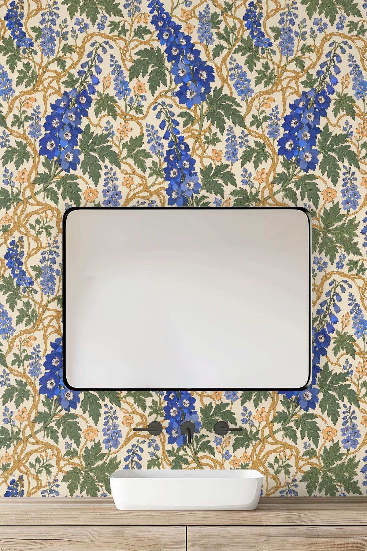 Soft peach blossoms among blue delphiniums and green leaves on wallpaper