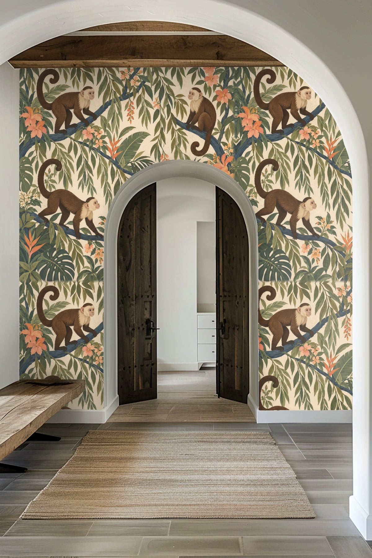 Bright laundry room wall decorated with wallpaper of tropical leaves, blooming flowers, and curious monkeys perched on branches