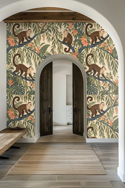 Bright laundry room wall decorated with wallpaper of tropical leaves, blooming flowers, and curious monkeys perched on branches