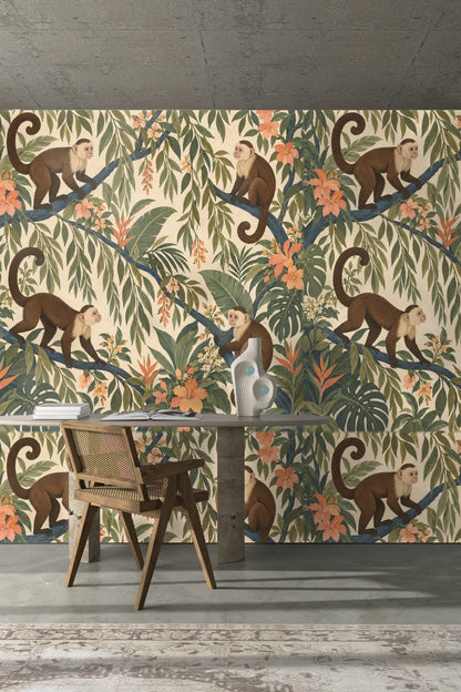 Arrangement of trailing vine leaves and peach-colored flowers creating a soft natural rhythm on wallpaper