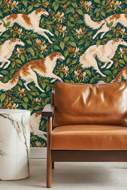 Living room with orange sofa and boho decor showcasing wallpaper with running sighthounds and honeysuckle flowers on teal background